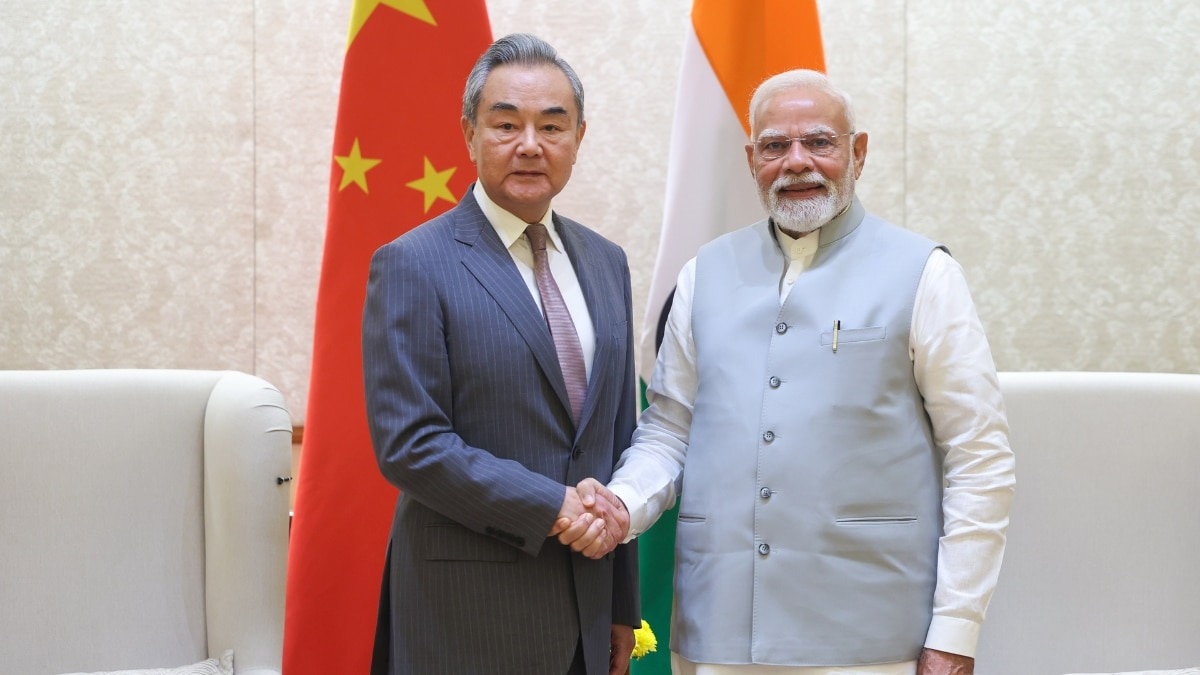 68a635f3c3ac7-modi-and-wang-yi-205405491-16x9.png